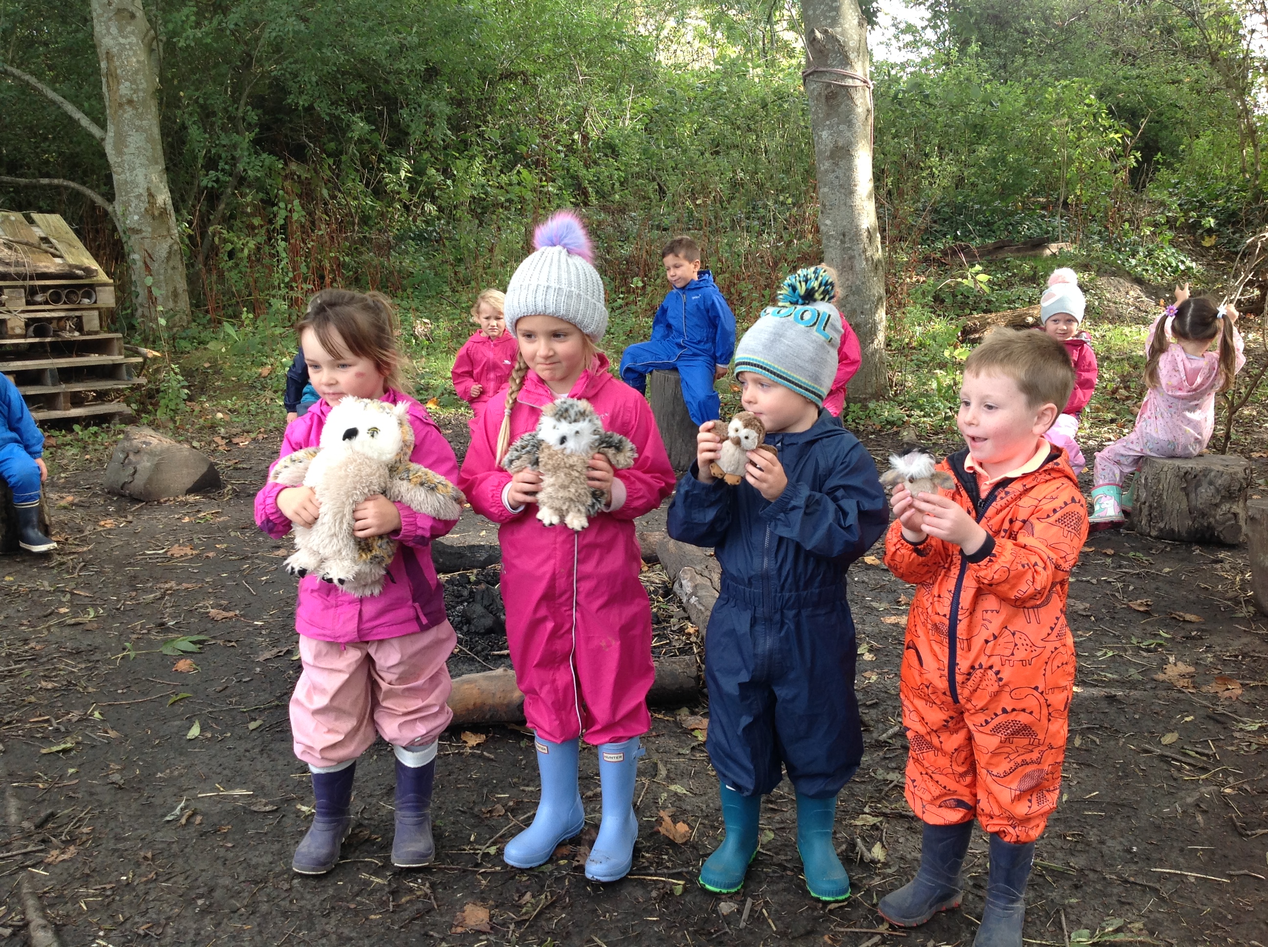 Children holding their owl toys.